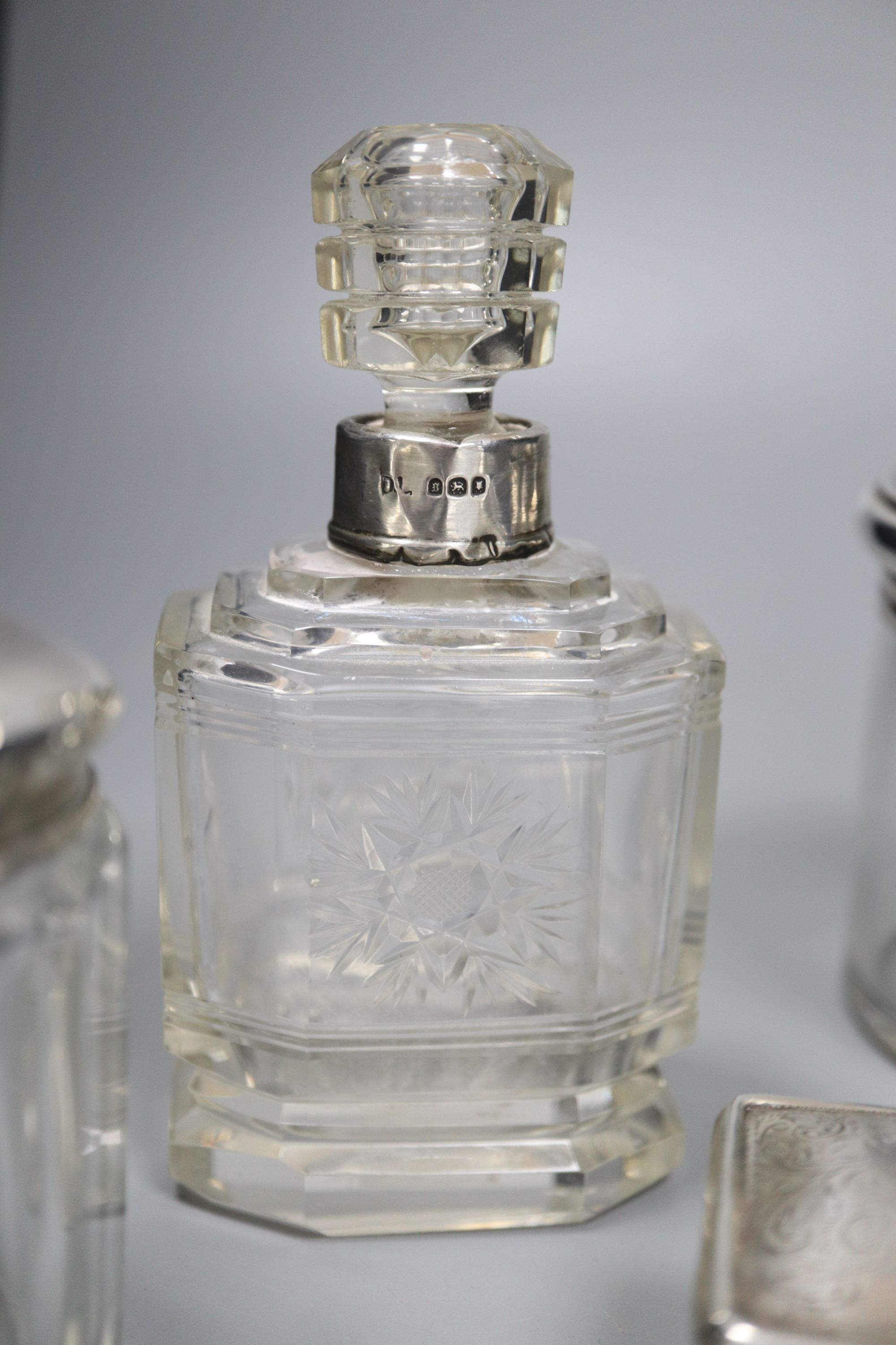 Ten silver top scent bottles